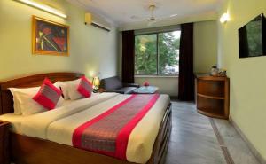 Postel nebo postele na pokoji v ubytování Hotel Pablas International, New Delhi, Near Metro
