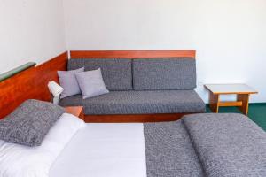 Voodi või voodid majutusasutuse Motel Arkus toas