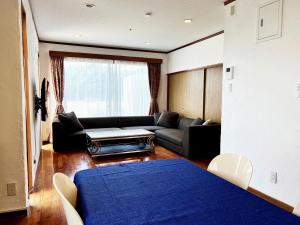 Voodi või voodid majutusasutuse 秘境の楽園 Cocos Harbor 奄美 toas