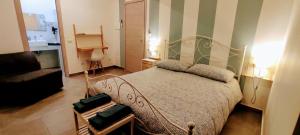 Postel nebo postele na pokoji v ubytování Ai Laghi Bed&Bed
