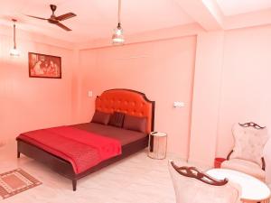 Katil atau katil-katil dalam bilik di Hotel Near Yashobhoomi - Dwarka Sec 8