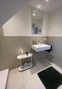Koupelna v ubytování Haus am See