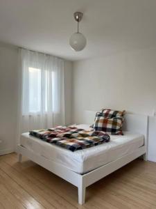 Postel nebo postele na pokoji v ubytování Haus am See
