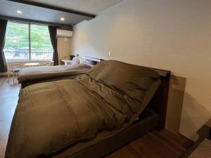 ryokan 天龍にあるベッド