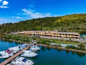 a group of boats docked in a marina at Affitti Brevi Toscana- La Vista sul Porto Superior in Talamone