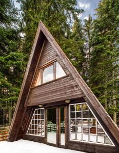 a small house with a gambrel roof at Chalet Musala in Borovets