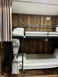 Postel nebo postele na pokoji v ubytování Rom Casa Hostel Da Nang