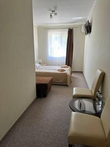 Postel nebo postele na pokoji v ubytování Готель-спа "Еліт"