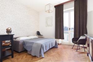 A bed or beds in a room at Casa di Crissy - centro Como