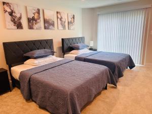 מיטה או מיטות בחדר ב-Cozy room in Charlottesville