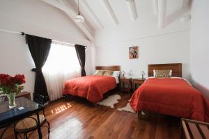 Ένα ή περισσότερα κρεβάτια σε δωμάτιο στο Wilkamayu Hotel