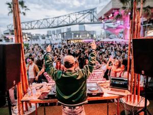 a man standing in front of a crowd of people at Boat House Barcelona in Barcelona