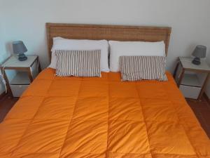Postel nebo postele na pokoji v ubytování Voglia di mare