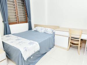 A bed or beds in a room at nha7bngo140tdh