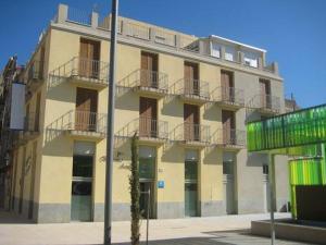 a large building with balconies on the side of it at Balcones Azules in Cartagena