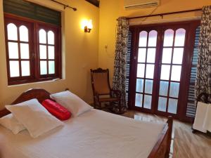 Postel nebo postele na pokoji v ubytování Ama HomeStay Guest Colombo