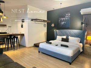 Uma cama ou camas num quarto em Cube 8teens by Nest Home