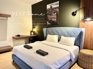 Uma cama ou camas num quarto em Cube 8teens by Nest Home
