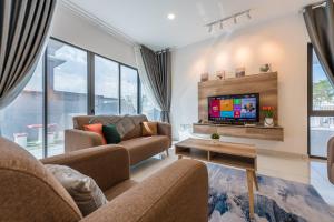 Imagen de la galería de 14pax+Cozy@Semi-Villa Seremban, en Siliau