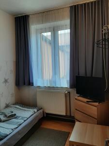 Postel nebo postele na pokoji v ubytování Noclegi Viktor