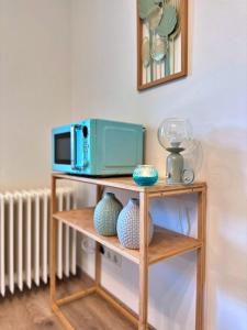 TV a/nebo společenská místnost v ubytování Garten-Blick-Baldeneysee