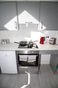 Eldhús eða eldhúskrókur á Unit 1 Island View Apartments - Town Centre Walk To Everything