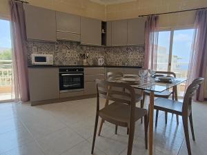 Kuchyň nebo kuchyňský kout v ubytování Hideaway Flats