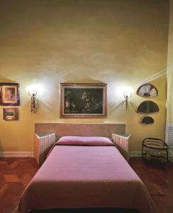 Säng eller sängar i ett rum på Il Salotto - Bed & Breakfast