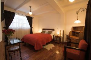 Ένα ή περισσότερα κρεβάτια σε δωμάτιο στο Wilkamayu Hotel