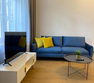 Televízia a/alebo spoločenská miestnosť v ubytovaní Old Town Residence Bis + 30 fotografií