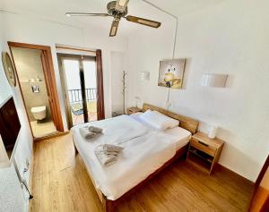 Postel nebo postele na pokoji v ubytování Hotel Marbel