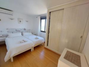 Postel nebo postele na pokoji v ubytování Hotel Marbel