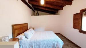 Postel nebo postele na pokoji v ubytování Casa Miret de Mur