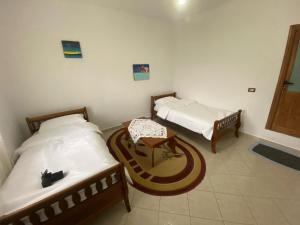 Katil atau katil-katil dalam bilik di Desao Apartment