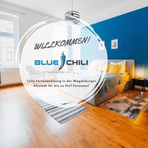 a bedroom with a blue chill sign in a room at Blue Chili 02 - MD Zentral City Carré Wlan in Magdeburg