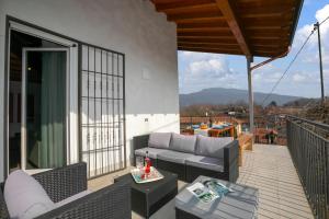 A balcony or terrace at Villa Laura Private Pool and Garden