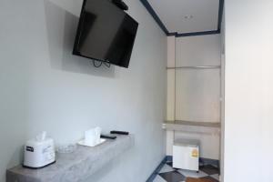 TV a/nebo společenská místnost v ubytování Numjaan Resort