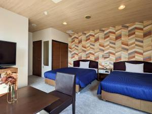 Katil atau katil-katil dalam bilik di Hotel New Gaea Yakuin