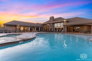 a house with a swimming pool in front of a house at Pebble Beach Oasis home in Washington