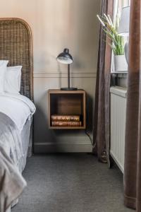 Säng eller sängar i ett rum på Brunnsvik Hotell & Konferens