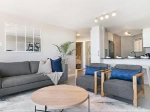 Posezení v ubytování Zeezicht 204 Bloubergstrand