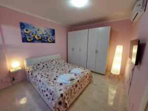 Postel nebo postele na pokoji v ubytování SWEETY LELE HOUSE
