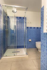 a bathroom with a shower and a toilet at Affittacamere del Golfo e delle 5 Terre in La Spezia