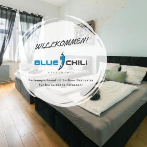 a bed in a room with a sign that reads blue chill at Blue Chili 30 - Industrial Chic im coolen Wedding - bis 6 Personen in Berlin