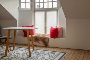 a window seat with a table in front of a window at Spacious Belle Epoque House with free parking in Ostend +48 photos