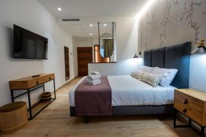 Säng eller sängar i ett rum på Complejo Valle Grande