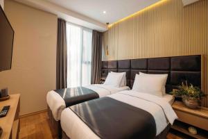 Postel nebo postele na pokoji v ubytování Hotel Monday by DNT Group