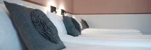 Katil atau katil-katil dalam bilik di Hotel Hottingen