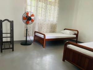 Voodi või voodid majutusasutuse 1818 Badulla toas