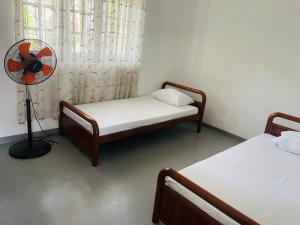 Voodi või voodid majutusasutuse 1818 Badulla toas